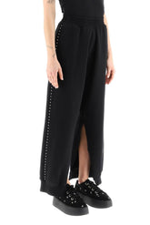STUDDED JOGGER PANTS WITH ANKLE SLITS
