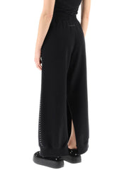STUDDED JOGGER PANTS WITH ANKLE SLITS