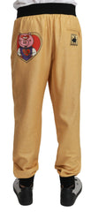 Dolce & Gabbana Elegant Gold Motif Sweatpants