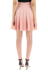 PLEATED MINI SKIRT IN JACQUARD KNIT