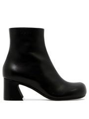 Ankle boots with shaped heel